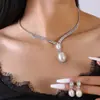 Venta al por mayor de Joyería Moda Nuevo Set de Collar Pendientes Pulsera Zirconia Brillante Set de Joyería Nupcial Collar para Clavícula