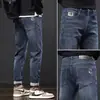 Marca de Tendência de Fábrica Original Jeans Azul Xintang Masculino Slim Fit Perna Afunilada Elástico Moderno Versátil Casual Calça Longa