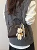 Bolsa feminina de nicho de alta qualidade, bolsa transversal casual versátil vintage de verão 2025, bolsa de mão feminina tipo almofada