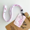 Sanrio Hello Kitty KT insignia juego de tarjetas con cordón largo tarjeta de comida para estudiantes cubierta protectora tarjeta de acceso tarjeta de autobús hebilla para bolsa colgante