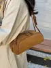 Bolsa de Bolos de Mano para Mujer 2026 Nuevo Otoño Invierno Súper Caliente Color Sólido Tacto de Alta Gama Hombro Único Bolso Baguette para Viaje