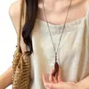 Nuevo collar colgante de pez de palisandro estilo chino, estilo étnico vintage, cadena larga versátil para suéter, accesorio de diseñador para mujer