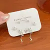 Pendientes de estilo coreano con exquisitos diamantes de la serie Saturno, de perlas, ligeros, lujosos, sencillos, de alta gama, con pasador de plata.