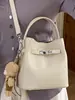 Bolso de Mano Pequeño Estilo Coreano para Mujer, Nuevo Bolso de Hombro Vintage Primavera 2026 para el Trabajo y los Viajes Diarios, Bolso Cruzado Tipo Cubo