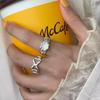 Anillo de Diseño de Nicho Estilo Coreano para Mujer con Lazo Hueco Ojo de Gato Anillo de Viento Frío Versátil Moda Nueva 2024