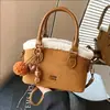 Bolso de axila retro de alta costura para mujer, nuevo modelo de invierno 2026, bolso de mano casual de gran capacidad, bolso tipo cubo, bolso de hombro