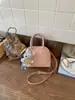 Mini Bolso de Concha para Mujer 2026 Nuevo Nicho de Gama Alta Bolso de Bolos de Moda Mini Bolso de Mano Bolso Bandolera para Mujer