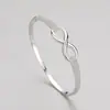 Pulseira de Prata Esterlina S925 Estilo Novo com Laço para Mulheres Europeias e Americanas, Design Moderno de Alto Padrão, Pulseira em Forma de Oito, Joia Elegante para Mão