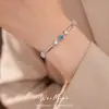 Pulsera con cierre de estrella de circonita chapada en oro real de 18k, sensación de lujo ligero de nicho de alta gama, accesorio de mano versátil y elegante