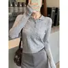 Suéter negro de hilo de núcleo otoño e invierno nuevo estilo para mujer prendas de punto de alta gama ropa interior de otoño e invierno top con cuello polo