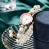 Reloj de mujer de cuarzo perla, nuevo, elegante y con estilo, de venta caliente, pulsera redonda ajustable libremente para estudiantes mujeres, al por mayor