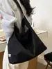 Bolso de Mujer Simple de Gran Capacidad 2026 Nuevo Bolso Ligero Simple para el Trabajo de un Solo Hombro Bolso Tote Versátil de Moda Tendencia