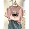 Camiseta de manga corta tie-dye azul con diseño único para mujer, moderna y versátil, adelgazante, hombro normal, top de algodón puro, verano 2026