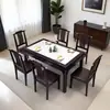 Nueva mesa de comedor de estilo chino, juego de mesa y sillas de tablero de roca, rectangular de madera maciza, diseño moderno minimalista, adecuado para casas pequeñas