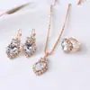 Comercio exterior transfronterizo popular juego de anillos collares pendientes de piedras preciosas de colores europeo y americano conjunto de tres piezas joyería para mujer al por mayor