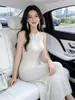 Vestido sin mangas de estilo coreano suave con calados de seda helada, impresionante y elegante vestido largo ajustado de estilo francés para la playa
