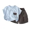 Traje de Manga Corta para Niños Verano 2026 Nuevo Estilo Ropa para Niños Estilo Coreano Camiseta Pantalones Cortos de Verano para Bebé Atractivos Conjunto de Dos Piezas Moderno