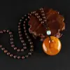 Nueva cadena de suéter de cera de abeja vieja color amarillo aceite de pollo imitación resina joyería de ámbar rosa collar largo suministro en vivo al por mayor