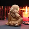 Pequeno sofá reclinável Maitreya ornamentos de lazer armário de TV doméstico decorações interessantes chinesas artesanato de resina fabricantes atacado