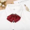 Fábrica directa de Song Xiaoxia, uniforme japonés JK a juego con cuello de color sólido doble, pajarita de rendimiento para campus con flores, tendencia coreana