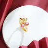 Anel de Ouro de Areia do Vietnã Transfronteiriço Anel de Trevo de Quatro Folhas Inlaid de Zircônio Colorido de Luxo Design All-match Feminino Joias Resistentes à Cor por Longo Tempo