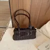 Bolso de lunares a la moda, modelo nuevo y simple, bolso de hombro único de nicho de moda para el día a día, versión coreana 2026, bolso de axila para mujer con diseño elegante