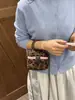 Bolso de hombro de moda para otoño 2026, bolso cruzado versátil con cadena y estampado de leopardo, bolso de mano para mujer, mini clutch