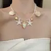 Estilo Vacaciones de Verano en la Costa Collar de Estrella de Mar y Concha Estilo Bohemio Cadena de Clavícula de Nicho Collar de Estrella de Mar