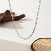 Bestseller transfronteiriço corrente minimalista francesa, colar de corrente fina em cruz de luxo leve, design de nicho simples versátil unissex corrente oca