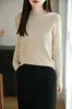 Nuevo suéter de punto casual versátil para mujer de otoño e invierno, cuello medio alto, algodón puro, ajuste ceñido, manga larga