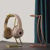 Soporte metálico original nuevo para auriculares de escritorio para ordenador Auriculares Auriculares Cableados Inalámbricos Estante de almacenamiento universal al por mayor