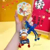 Amuleto de Buena Suerte Original Jinnew - Llavero Colgante de PVC Danza del León con Cojín, Elemento de Diseño Único Colgante para Bolsa