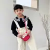 Bolso Bandolera Infantil Lindo con Lazo Moda Primavera 2026 Cartera Pequeña para Niñas de Cuero PU Bolso Decorativo para Bebé
