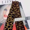 [Suministro directo de fábrica] top de cintura para mujer con estampado de leopardo amarillo terroso banda elástica tejido jacquard de color banda elástica para cintura de pantalón cabeza de falda goma