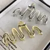 Presilha de Garra Grande Metal Onda Simples para Mulheres Senso de Design Nicho Presilha Tubarão Parte de Trás da Cabeça Senso de Moda Versátil Acessório de Cabelo Garra