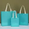 Bolsa tote de tecido não tecido com botão oculto de loja de roupas femininas da moda, bolsa de compras ecológica para roupas e acessórios femininos, pode ser impressa com logotipo