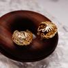 Pendientes elegantes para mujer, de alta gama, de moda, exquisitos pendientes de circonita hueca que combinan con todo, de estilo europeo y americano, ligeros y lujosos.