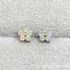 ASTMF-13 Aleación de Titanio Dorado Súper Brillante Zircón Redondo Flor de Cinco Pétalos Titanio G23 Rosca Interna Joyería de Pendiente de Zirconia para Perforación