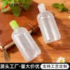 Botella de agua desmaquillante de 500 ml transparente hombro redondo botella pura Dew hebilla tapa abatible Botella de tónico botella divisible para cosméticos PET