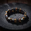 Pulsera de cuentas de doble fila ojo de tigre y piedra de ágata negra media luna, de moda y versátil, sensación de alta gama, accesorio simple para hombres y mujeres