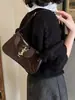 Nova Bolsa de Ombro da Moda 2026 com Toque de Luxo, Bolsa Versátil Feminina de Estreia Transfronteiriça, Bolsa Baguete Lisa Estilo Americano