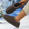 Nuevas botas de nieve UG 2025, disponibles en tallas grandes para ventas transfronterizas, con un diseño de suela delgada estilo étnico y estilo de pareja, así como pantuflas de algodón para mujer