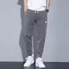 Calça jeans jogger masculina nova de renda para primavera e outono, importada, corte solto, cintura elástica, marca moderna, workwear, casual, calça comprida versátil