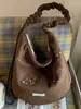 2026 Primavera Temprana Nuevo Bolso de Axila Artístico de Nicho Bolso Tote de Gran Capacidad Bolso de Mano para Estudiantes y Viajeros Frecuentes Bolso de Hombro