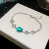 ¡Joyería de cadena colorida! Pulsera ovalada de circonita súper brillante, sensación de lujo ligero y alta gama, joyería versátil y exquisita para mujer al por mayor