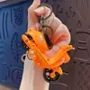 Chaveiro criativo de patinete elétrico de puxar, brinquedo divertido para aliviar o estresse para estudantes, pequena mercadoria para bancas, atacado
