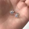 Pendientes de botón de circonita estilo INS, venta transfronteriza europea y americana, con diseño geométrico de ojo, pendientes de botón con temperamento para mujer