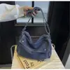 Nova Versão Coreana da Bolsa Transversal Simples Retro Original para Mulheres Primavera & Outono 2026 Bolsa de Ombro de Nicho Bolsa Tote de Alta Qualidade