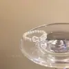 Anel Elástico de Pérola em Forma de Laço para Mulheres Leve Luxo Elegante Anel de Dedo Empilhável de Alto Nível Estilo Frio do Instagram Anel de Dedo