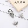 Joyería para Uñas de Moño Nuevo Colgante de Borla Diamante de Zirconia Súper Brillante Popular en Internet Cadena de Joyería para Decoración de Uñas